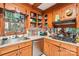 Classic kitchen featuring wood cabinetry, stainless steel appliances, and a functional layout at 8504 Knollwood Cir, Charlotte, NC 28213