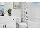 Stylish bathroom with white vanity, toilet, and bathtub at 8692 Acadia Pkwy # 591, Sherrills Ford, NC 28673