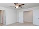 Bedroom with carpeted floors, neutral walls, ceiling fan, and walk-in closet at 8692 Acadia Pkwy # 591, Sherrills Ford, NC 28673