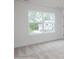 Bedroom with a large window offering an exterior view at 8692 Acadia Pkwy # 591, Sherrills Ford, NC 28673