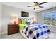 Stylish bedroom features a modern bed, nightstands, and a scenic view at 8692 Acadia Pkwy # 591, Sherrills Ford, NC 28673
