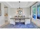 Elegant dining room featuring pendant lighting, blue rug, and seating for six at 8692 Acadia Pkwy # 591, Sherrills Ford, NC 28673