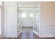 Bright entryway with a view of a room with hardwood floors, through glass french doors at 8692 Acadia Pkwy # 591, Sherrills Ford, NC 28673