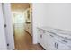 Hallway featuring gray granite countertop and plenty of storage at 8692 Acadia Pkwy # 591, Sherrills Ford, NC 28673