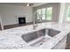 Modern kitchen featuring granite countertops, stainless steel sink and faucet, and open layout at 8692 Acadia Pkwy # 591, Sherrills Ford, NC 28673