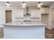 Modern kitchen featuring stainless steel appliances, a large island, granite countertops, and subway tile backsplash at 8692 Acadia Pkwy # 591, Sherrills Ford, NC 28673
