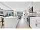 Spacious, all-white kitchen featuring a large island, modern appliances, and ample counter space at 8692 Acadia Pkwy # 591, Sherrills Ford, NC 28673