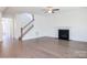 Spacious living room featuring hardwood floors, a fireplace, and ample natural light at 8692 Acadia Pkwy # 591, Sherrills Ford, NC 28673