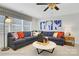 Bright living room features a comfortable sectional sofa and decorative artwork at 8692 Acadia Pkwy # 591, Sherrills Ford, NC 28673