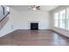 Spacious living room features a fireplace, ceiling fan, and an abundance of natural light at 8692 Acadia Pkwy # 591, Sherrills Ford, NC 28673