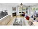 Comfortable living room showcasing a fireplace and view through a large window at 8692 Acadia Pkwy # 591, Sherrills Ford, NC 28673