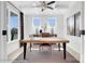 Bright office space featuring a modern wood desk, neutral carpeting, and contemporary decor at 8692 Acadia Pkwy # 591, Sherrills Ford, NC 28673
