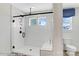 Modern bathroom with white tiled shower and black hardware at 8692 Acadia Pkwy # 591, Sherrills Ford, NC 28673