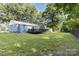 Enjoy this large backyard offering a wood deck and ample space for recreational activities at 875 Marys Grove Rd, Cherryville, NC 28021