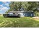 Expansive backyard featuring a wooden deck and a level lawn perfect for outdoor activities at 875 Marys Grove Rd, Cherryville, NC 28021