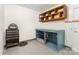 Finished basement with built-in shelving, work bench, and storage for tools and equipment at 875 Marys Grove Rd, Cherryville, NC 28021