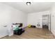 Large bedroom with wood floors, closet, and access to the adjacent room at 875 Marys Grove Rd, Cherryville, NC 28021