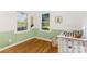 Sunlit bedroom with hardwood floors and a window with a view of the outdoors at 875 Marys Grove Rd, Cherryville, NC 28021