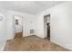 Well-lit bedroom with neutral carpet, white walls, and doors to other rooms at 875 Marys Grove Rd, Cherryville, NC 28021