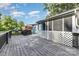 Large wooden deck with grill, and an enclosed outdoor space for relaxing and entertaining at 875 Marys Grove Rd, Cherryville, NC 28021