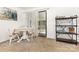 Cozy dining area with a round table, three chairs, and view to the screened porch at 875 Marys Grove Rd, Cherryville, NC 28021