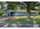 Charming exterior view of this home featuring blue siding, a carport, and a well-manicured lawn at 875 Marys Grove Rd, Cherryville, NC 28021