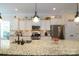 Bright kitchen boasts granite countertops, stainless steel appliances, and ample cabinet space at 8818 Artesa Mill Ln, Charlotte, NC 28214