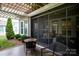 Outdoor patio with table and chairs, perfect for dining and entertaining at 8818 Artesa Mill Ln, Charlotte, NC 28214