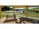 View of tennis courts from the covered picnic area at 8818 Artesa Mill Ln, Charlotte, NC 28214