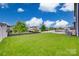 Spacious backyard with well-maintained lawn and a patio area for outdoor entertaining at 1033 Dorsey Dr, Fort Mill, SC 29715