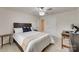 Bedroom with a bed, side tables, and dark wood furniture, offering a cozy feel at 1033 Dorsey Dr, Fort Mill, SC 29715