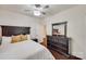 Comfortable bedroom with dark wood furniture, including a dresser and headboard at 1033 Dorsey Dr, Fort Mill, SC 29715