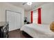 Cozy bedroom with ample natural light, closet space, and dark wood flooring at 1033 Dorsey Dr, Fort Mill, SC 29715