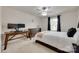 Bedroom featuring a desk, dresser, and a comfortable bed with a window view at 1033 Dorsey Dr, Fort Mill, SC 29715
