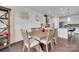 Elegant dining room with wood table and chairs, and modern decorations at 1033 Dorsey Dr, Fort Mill, SC 29715