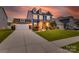 Beautiful two-story home with a well-lit entrance, landscaped yard, and a two-car garage at 1033 Dorsey Dr, Fort Mill, SC 29715