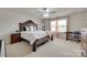 Comfortable main bedroom with a decorative bed frame and an abundance of natural light at 1033 Dorsey Dr, Fort Mill, SC 29715