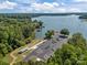 Aerial view of a boat parking area with scenic lake and trees in the background at 104 Golden Bell Ct, Mooresville, NC 28117