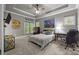 Bedroom featuring a bed, desk, and large window at 104 Golden Bell Ct, Mooresville, NC 28117