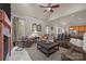 Bright living room with fireplace, neutral walls, and comfortable seating at 104 Golden Bell Ct, Mooresville, NC 28117