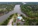 Stunning aerial view of the community pool, clubhouse, and lake access at 1096 Palmyra Dr, Tega Cay, SC 29708