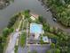 Overhead view of community amenities with a swimming pool, beach, and recreation areas at 1096 Palmyra Dr, Tega Cay, SC 29708