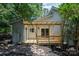 The home features a new wooden patio and a sliding glass door entry point at 1096 Palmyra Dr, Tega Cay, SC 29708