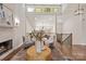 A stylish living room features neutral paint, a stone fireplace, recessed lighting, and stylish decor at 1096 Palmyra Dr, Tega Cay, SC 29708