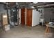 Basement mechanicals featuring duct work and closet access at 116 Lanes End Rd, Locust, NC 28097