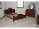 Bedroom showcasing a wooden bed frame, night stand and dresser at 116 Lanes End Rd, Locust, NC 28097