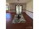 Bright dining room featuring hardwood floors, a chandelier, and a stylish area rug at 116 Lanes End Rd, Locust, NC 28097