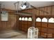 Spacious garage interior showing garage door openers and wood paneled doors at 116 Lanes End Rd, Locust, NC 28097