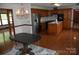 Traditional eat-in kitchen with wood cabinets, stainless steel appliances, and hardwood floors at 116 Lanes End Rd, Locust, NC 28097