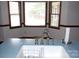 Bright kitchen sink area with a bay window that offers a great view at 116 Lanes End Rd, Locust, NC 28097
